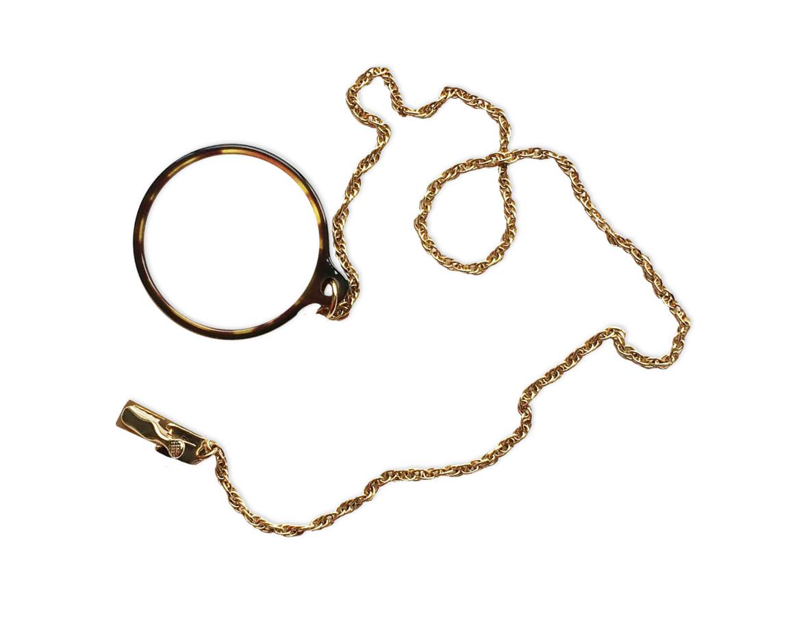 Monocle with a golden chain