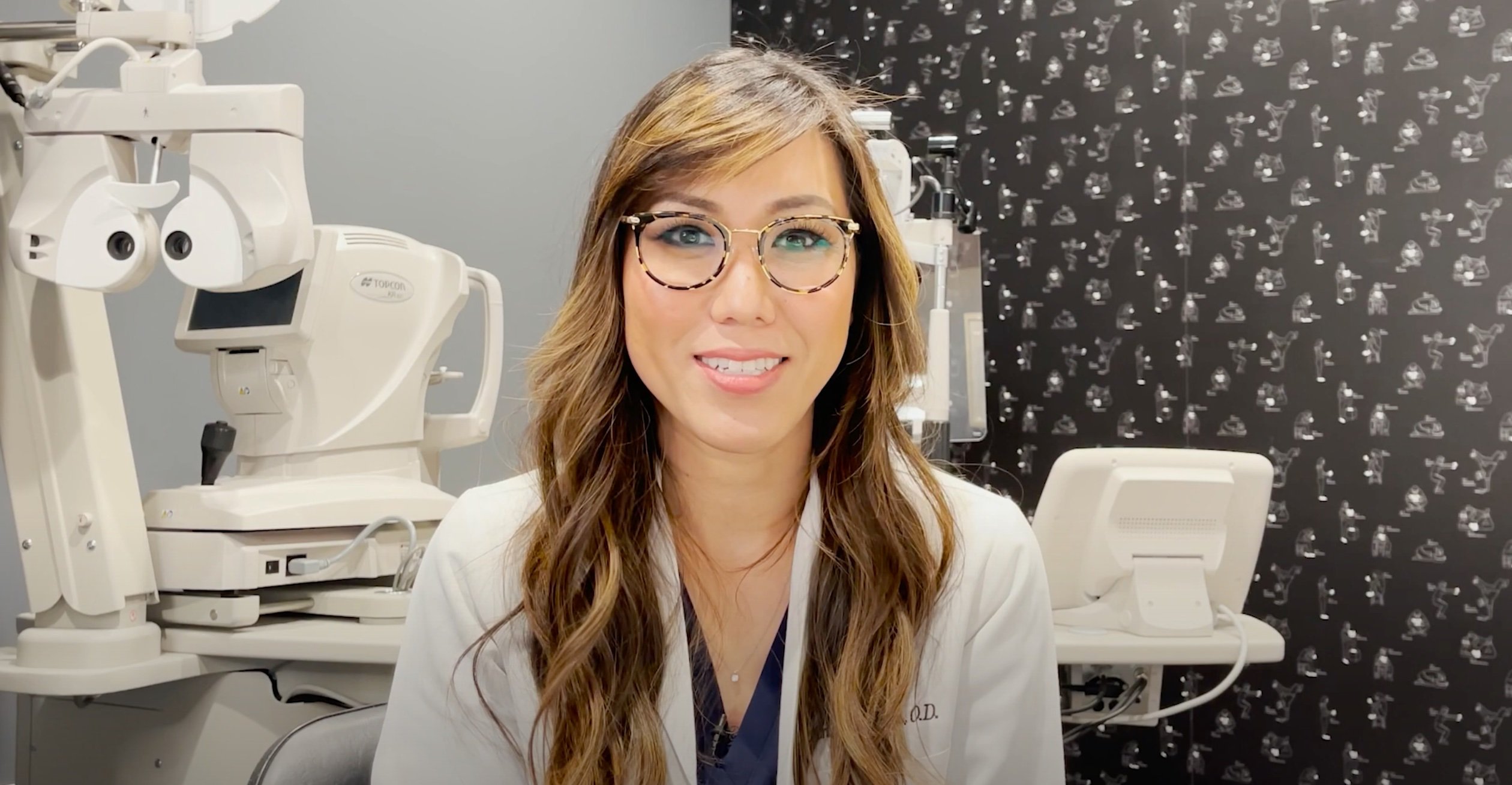Smiling female optometrist
