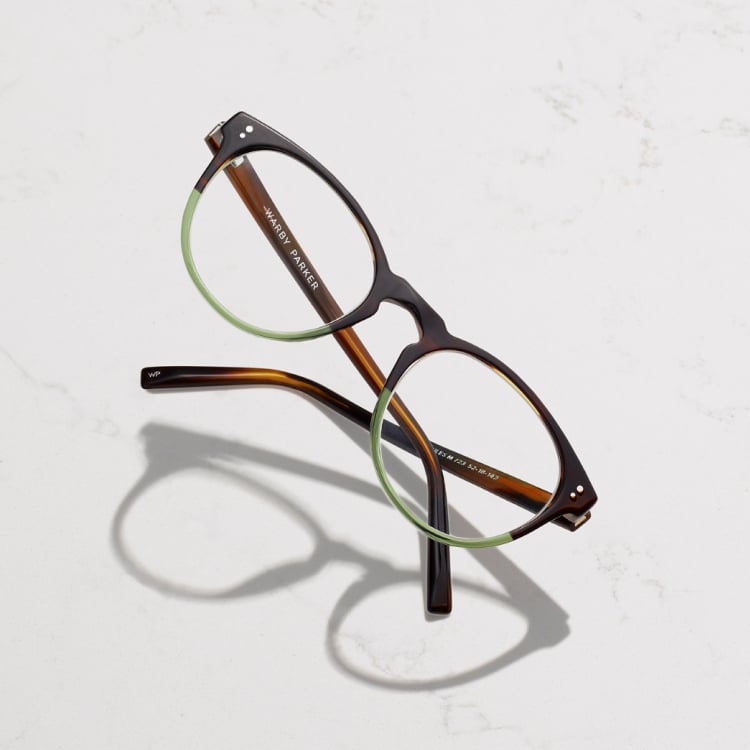 Pair of green, brown, and black glasses