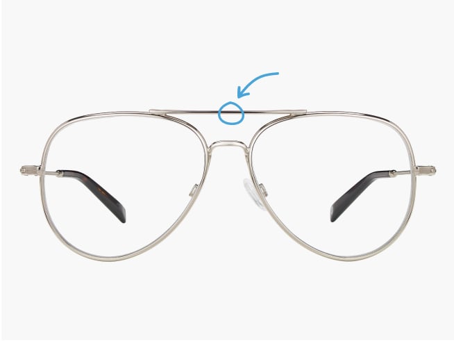 Aviator-style glasses with an arrow pointing to the brow bar