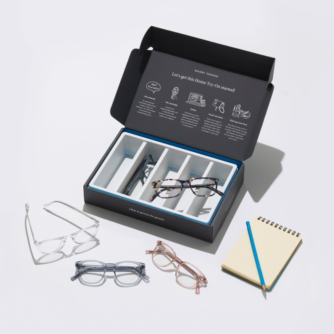Various glasses frames in a box designed to send frames to your home for home try-on