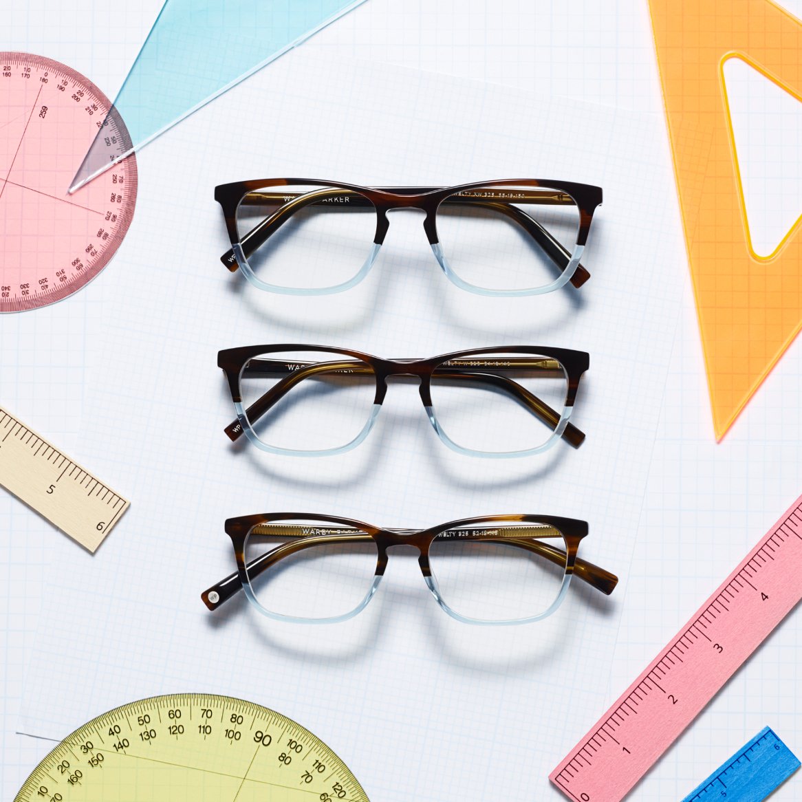 Glasses frames pictured alongside measuring tools