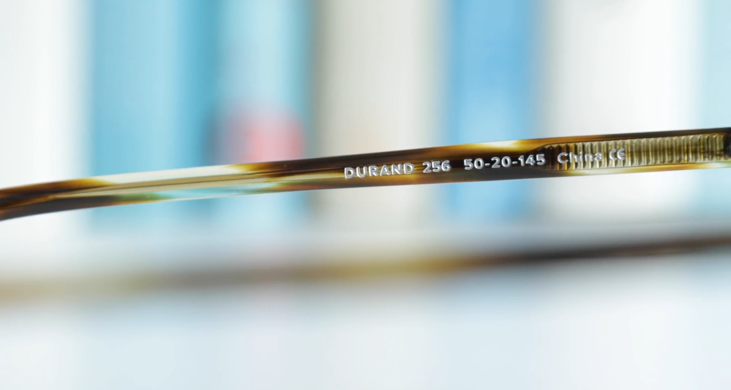 Close-up of measurements inside glasses frame arm