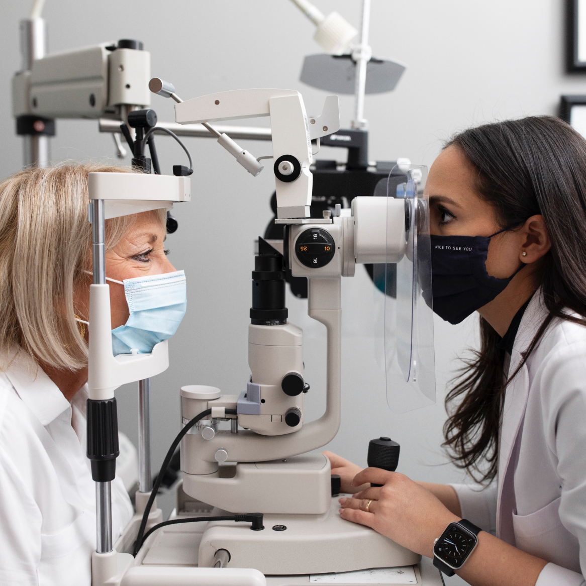 An optometrist performing visual field testing