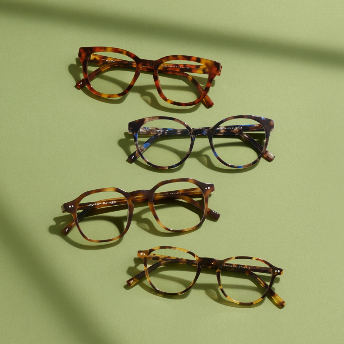 image of glasses on green background